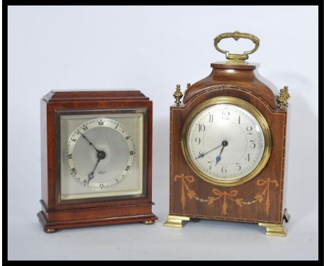 Two early 20th century Edwardian mantle clocks one an Elliott mantel clock with square silvered dial, on plinth base and bras