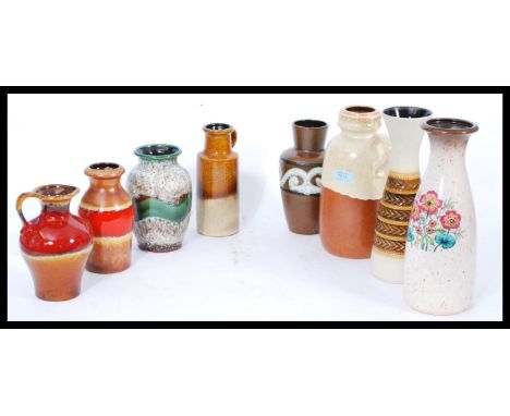 A collection of vintage retro mid 20th century West German pottery to include vases and jugs, fat lava type etc. Please see i