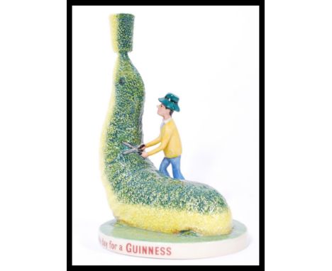 A Royal Doulton advertising ceramic figurine Guinness Topiary Sealion MCL28 Limited edition 118/750. Complete in original box