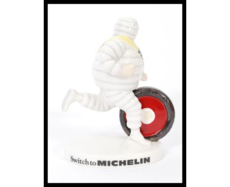 A Royal Doulton advertising ceramic figurine&nbsp; Bibendum The Michelin Man MCL9. Limited edition 321/2000. Complete in orig