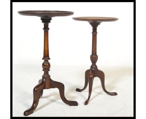 A 19th century Victorian mahogany wine table raised on tripod legs with turned column and circular terraced top. Together wit