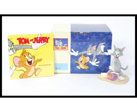 A group of five boxed ceramic figures to include Wedgwood Tom and Jerry, Beswick Tom and Jerry and a Royal Doulton Disney Jim