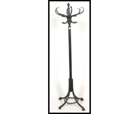 A vintage retro 20th century bentwood coat stand in the manner of Thonet having an ebonised finish.&nbsp;Measures: 185cm high