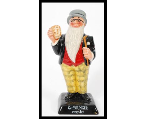 A Royal Doulton advertising ceramic figurine Father William AC2. Limited edition 321/2000. Complete in original box with cert