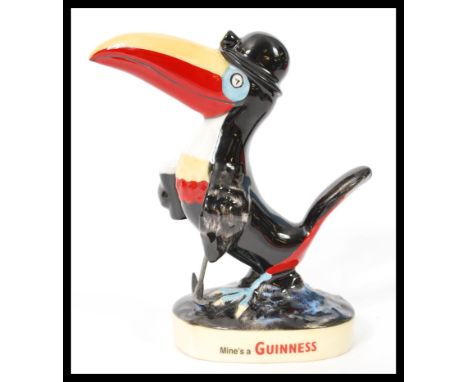 A Royal Doulton advertising ceramic figurine Guinness Miner Toucan MCL12. Limited edition 1214/2000. Complete in original box