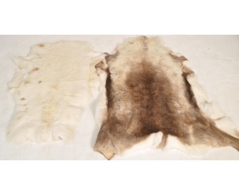 2&nbsp; vintage 20th century Reindeer skin taxidermy floor rugs / rug of typical form. Please see images having makers label 