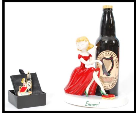 A Royal Doulton advertising ceramic figurine Guinness Harpist MCL29. Limited edition 12/750. Complete in original box with ce