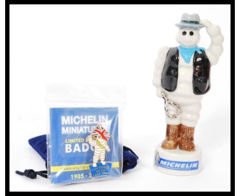 A set of four Wade advertising ceramic figurines for Michelin to include Sailor Bibendum 9/750, Red Indian Bibendum 9/750, Sa