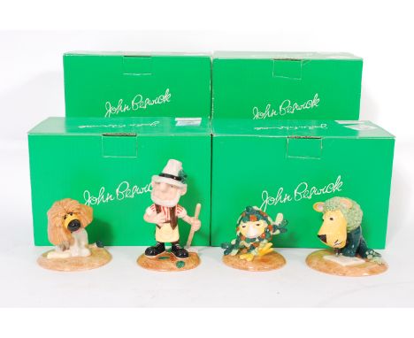 A collection of four boxed Beswick Herbs ceramic figures to include Bayleaf Gardener, Parsley The Lion, Sage The Owl and Dill