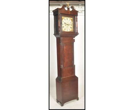 A 19th century mahogany painted face Southern Counties Longcase clock. The mahogany case and hood with glass facia housing a 