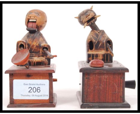 Two original vintage Japenese Meiji/early Showa period Kobe Toy wooden carved automaton figures of stylised japenese men . Bo
