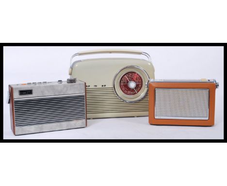 A group of three vintage 20th Century portable transistor radios to include a Roberts R727 AM / FM 5 - band radio, a Bush TR1