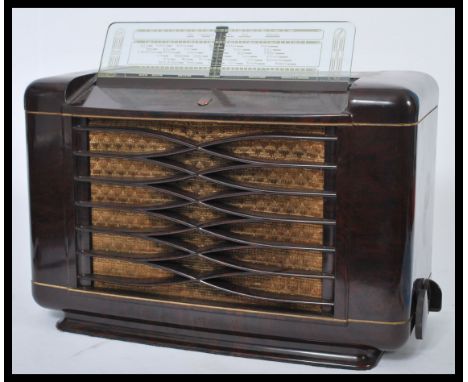 A vintage 20th Century Art Deco Philips bakelite valve radio Type 462 A / 15, the fabric covered speaker aperture with lattic