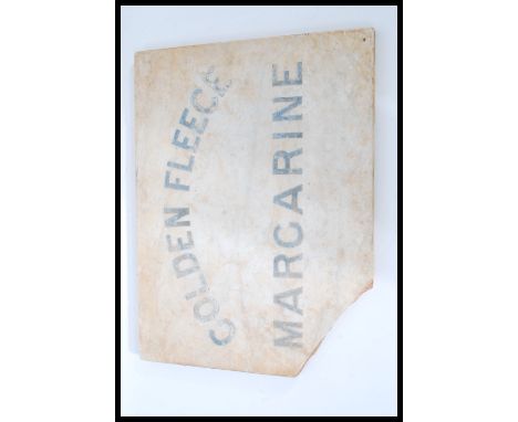 A vintage 20th Century white marble point of sale advertising counter top tray bearing script in lead&nbsp; " Golden Fleece M