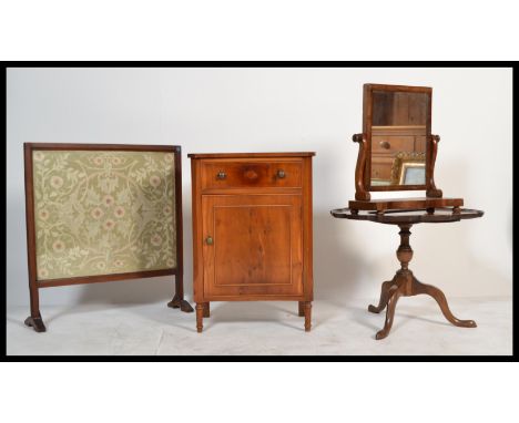 A Victorian 19th century mahogany ladies dressing table swing mirror together with a Regency revival yew wood bedside cabinet