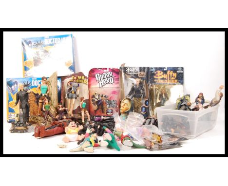 A large assorted collection of loose and boxed action figures to include loose vintage Ghost Busters , Pirates Of The Caribbe
