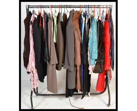 A collection of vintage clothing to include a selection of gentleman's ties, ladies lined fur coat, Blays of Glastonbury sued