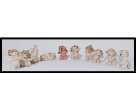 A group of Nao ( LLadro ) cherubs figurines in various poses. All stamped for Nao. (10) Measures 9cms high.