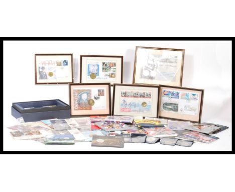 A large collection of vintage coin covers and coin packs some being framed. FDC's coin covers also Military and History relat