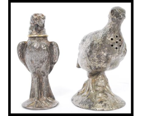 A pair of 20th century novelty desk/ mantelpiece salts in the form of birds - one being a falcon. Please see images.