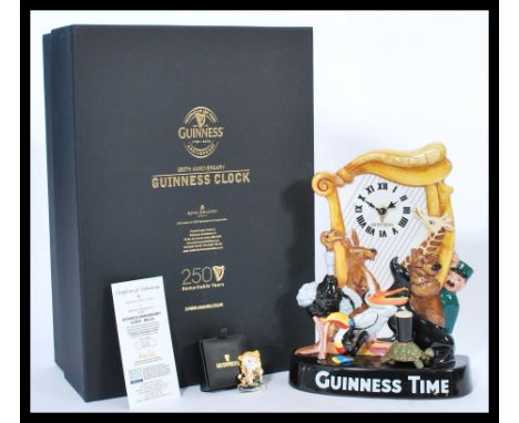 A Royal Doulton limited edition Guinness Anniversary clock MCL26, no. 28/350, modelled by Shane Ridge with original box and c
