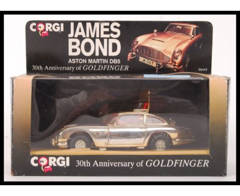 An original boxed Corgi diecast scale model car, James Bond 30th Anniversary of Goldfinger ' Aston Martin DB5 ' 9445 . Appear