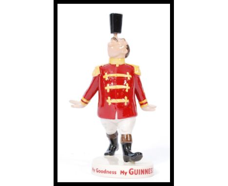 A Coalport ceramic Guinness advertising figurine Ringmaster. Limited Edition 18/2000. Complete in original box with certifica