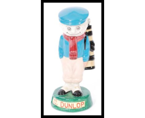 A Royal Doulton Advertising ceramic figurine The Dunlop Caddie MCL2. Limited edition 337/2000. Complete in original box with 