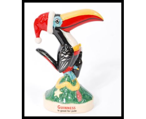 A Royal Doulton advertising ceramic figurine Guinness Christmas Toucan MCL6. Limited edition 1543/2000. Complete in original 