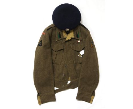 A WW2 British 1941-pattern battledress blouse, bearing Polish insignia to include Light Artillery collar pennants, embroidere