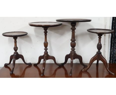 A lot of four assorted 20th century mahogany circular topped tripod wine tables (4) Condition Report:Available upon request