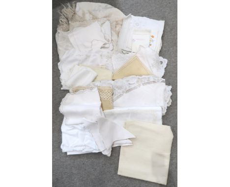 A cream silk piano / bridal shawl together with a quantity of table linen Condition Report:No condition report available.