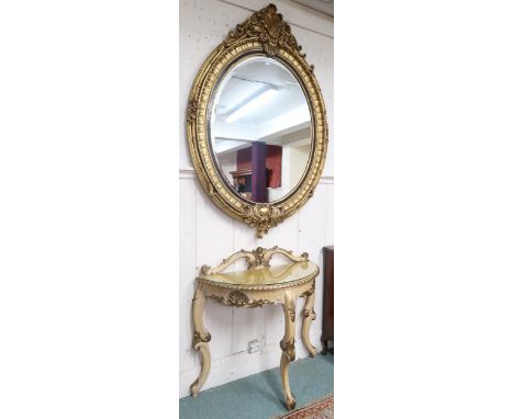 A lot comprising large 20th century gilt Rocco style oval bevelled glass wall mirror, 152cm high x 104cm wide and accompanyin