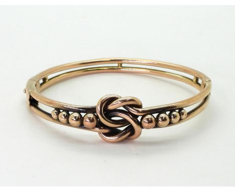 A 9ct gold knot pattern vintage bangle, inner diameter 5.8cm, weight 15.2gms Condition Report:Available upon request