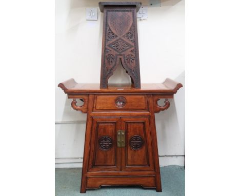 A lot comprising 20th century Chinese hardwood altar cabinet with shaped top over single drawer over pair of cabinet doors, 7