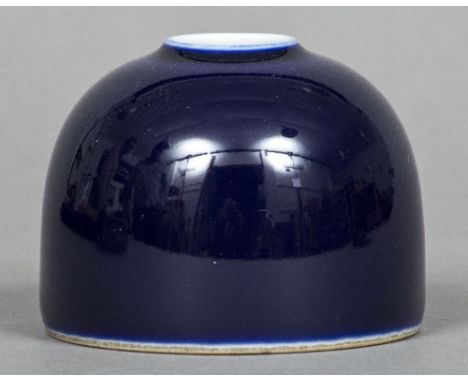 A Chinese dark blue ground porcelain ink potOf beehive form, the underside with blue painted seal mark.  6 cm high.    CONDIT