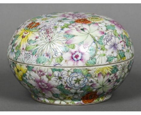 A Chinese millefiori porcelain box and coverOf circular section and typically decorated in bright enamels, red painted six ch