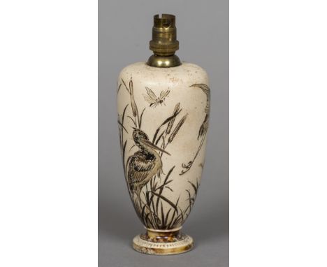 A Martin Brothers pottery vaseSgraffito decorated with herons and insects amongst water reeds, signed R W Martin Bros, London