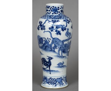 A 19th century Chinese blue and white porcelain baluster vaseUnusually decorated with various animals in a continuous landsca