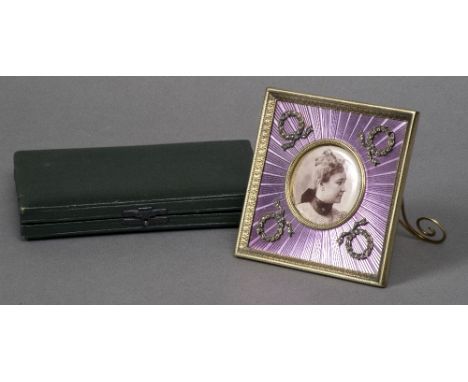 A Russian purple guilloche enamel decorated silver gilt photograph frameOf square form set with diamond set swags of bow tied