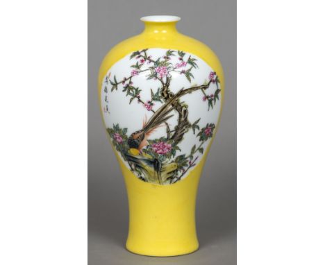 A Chinese Republic period porcelain vaseOf slender baluster form, decorated with bird vignettes, signed with calligraphic tex