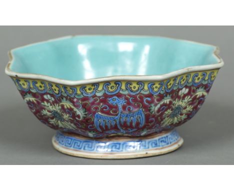 A Chinese porcelain bowlOf lobed octagonal form, the exterior decorated with dragons and floral sprays, the underside with re