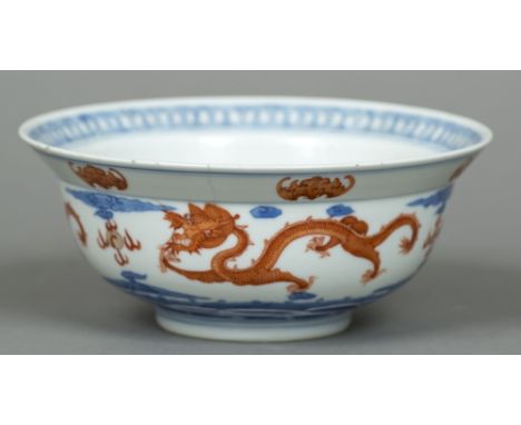 A Chinese porcelain bowlWith flared rim, the interior decorated with a five clawed dragon, the exterior decorated with a band