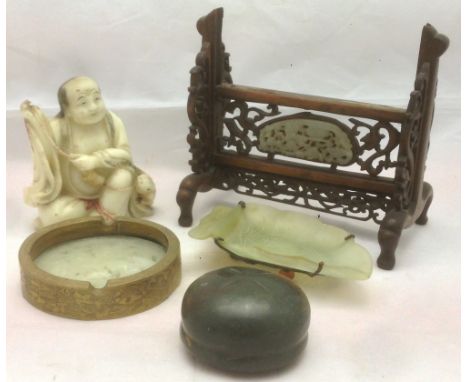 Five Chinese collectors' itemsComprising: a carved hardstone figure, a carved hardstone scroll weight, a jade mounted carved 