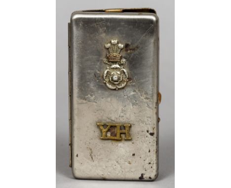 Yorkshire Hussars (1794-1956), a chromed cigarette caseThe hinged cover mounted with an officer's cap badge and an epaulette 