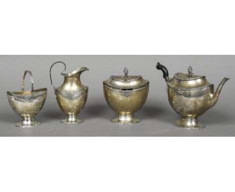 A late 18th century Dutch four piece silver tea setComprising: teapot, cream jug, a tea caddy and a sugar basket, each piece 
