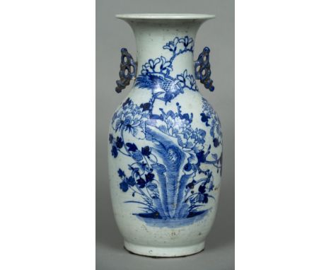 A Chinese blue and white vaseThe flared neck rim with internal wax customs seal, above twin pierced handles and decorated wit