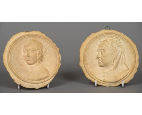 A pair of Martin Brothers pottery Royal commemorative plaquesBoth worked with portraits of Queen Victoria, one dated 1837, th
