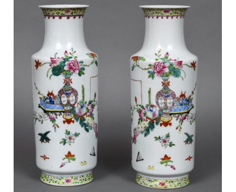 A pair of early 20th century Chinese porcelain rouleau vasesEach painted with a flowering vase and planter amongst various fl