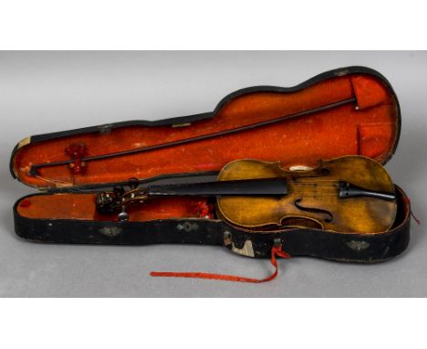 A 19th century violinWith single piece back and lion carved stock; together with a bow, housed in a case bearing a label insc